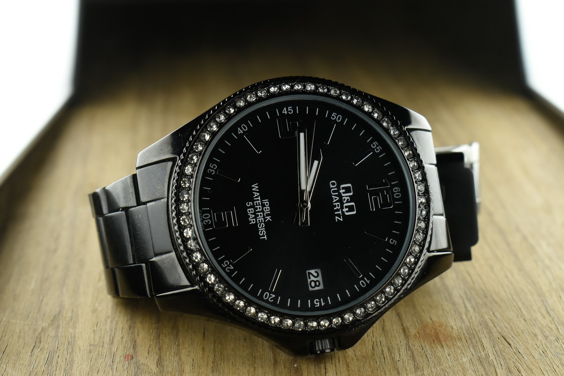 a black watch with a white face